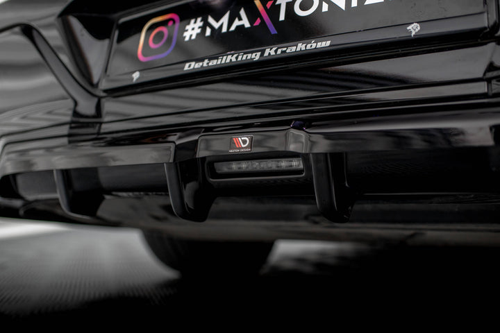 CENTRAL REAR SPLITTER (WITH VERTICAL BARS) BMW 7 M-PACK G70